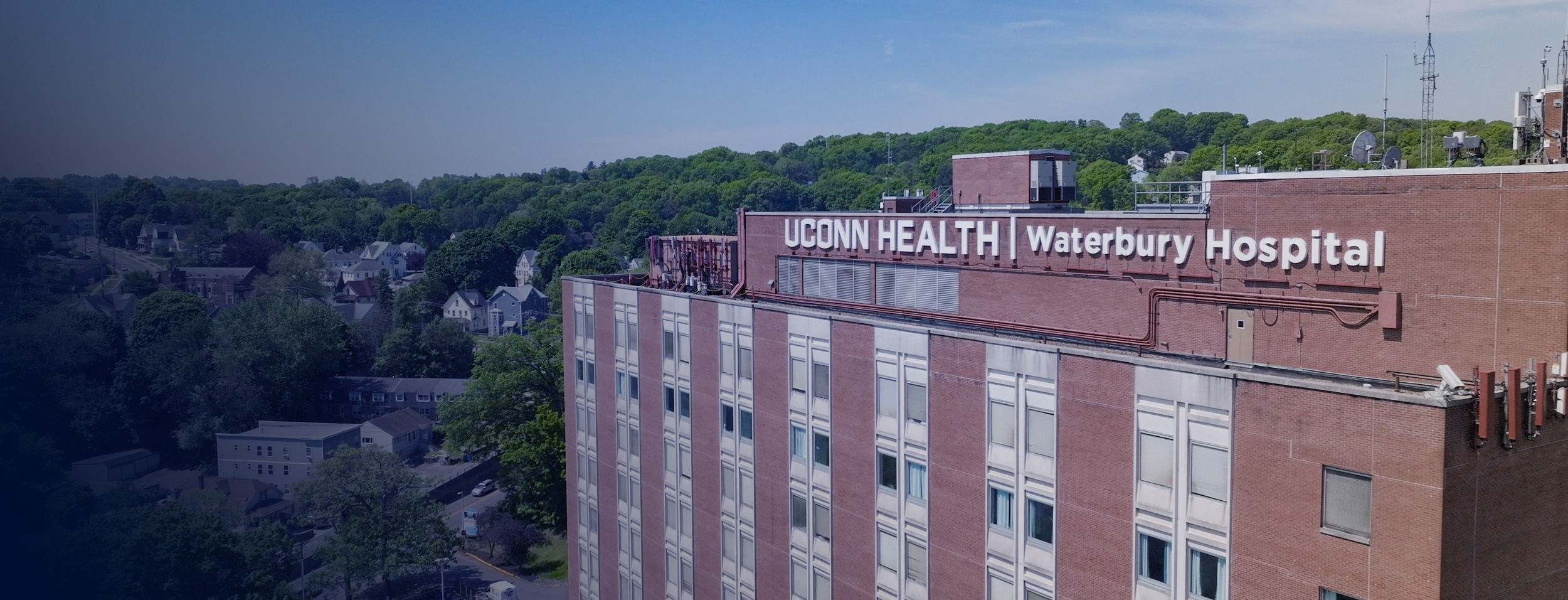 Aerial drone photo of the top of UConn Health Waterbury hospital building.